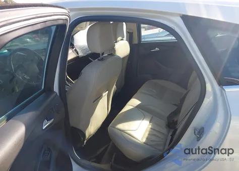 2015 Ford Focus Titanium z USA, uszkodzony, nr VIN 1FADP3N25FL216058